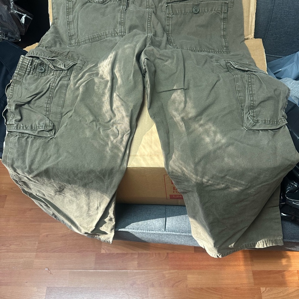 Off color of brown pants. Heavy for winter. May of worn them once. All buttons